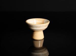 Ceramic Sake Cup on a black reflective surface