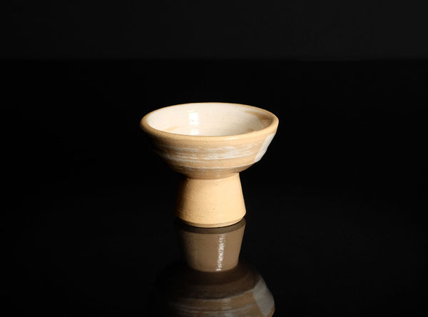 Ceramic Sake Cup on a black reflective surface