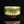 將圖片載入到圖庫檢視器中， Green ceramic bowl with textured surface on a black background
