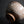 將圖片載入到圖庫檢視器中， A rustic handmade ceramic bowl with a textured, speckled glaze in earthy brown, beige, and gray tones, photographed on a dark reflective surface against a black background.
