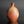 將圖片載入到圖庫檢視器中， A handmade ceramic bottle with a rounded body and short neck, featuring a textured glaze that transitions from reddish-brown to light beige, set against a dark gray background.
