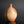 將圖片載入到圖庫檢視器中， A handmade ceramic bottle with a rounded body and a short, narrow neck, featuring a textured earthy brown and orange glaze, set against a dark gray background with a reflective black surface below.
