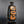 Load image into Gallery viewer, Black ceramic vase with orange designs of horses on a gray background
