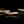 Load image into Gallery viewer, A Set of Five Bizen Chopstick Rests with a metallic sheen on a black reflective surface
