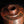 Load image into Gallery viewer, A Shudo Bronze Vase with layered design on a dark background
