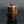 Load image into Gallery viewer, A Shudo Bronze Vase with layered design on a dark background
