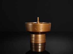 A Brass Incense Burner "Tsuchinoto-Mi"  on a black background