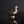 將圖片載入到圖庫檢視器中， A metallic bird-shaped object with a smooth matte finish, featuring a beak, body, and a curved tail opening, photographed on a glossy black reflective surface against a black background.
