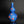 將圖片載入到圖庫檢視器中， Blue vase with floral designs on a dark background
