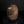 Load image into Gallery viewer, Textured ceramic vase on a dark reflective surface with a black background

