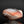 Load image into Gallery viewer, Ceramic vase with a textured surface on a reflective black surface
