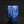 Load image into Gallery viewer, A handmade ceramic cup with a textured, faceted design, featuring a glossy blue and matte black glaze with a light blue and white cracked tile motif on the front, set against a dark background

