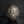 將圖片載入到圖庫檢視器中， A dark metallic sculpture or decorative vase featuring a stylized human figure in relief, photographed against a dark studio background with a reflective surface below.
