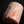 Load image into Gallery viewer, Cylindrical ceramic object with a textured surface on a black background
