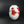 Load image into Gallery viewer, A white ceramic vase decorated with red cherry blossoms and brown branches, set against a dark gray background.
