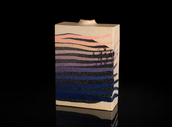 Rectangular ceramic vase with a landscape design on a black background