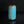 Load image into Gallery viewer, Blue ceramic vase with gold accents on a black background
