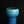 Load image into Gallery viewer, Blue ceramic vase on a black background
