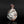 將圖片載入到圖庫檢視器中， A small ceramic bottle with a rounded body, narrow neck, and flared rim, featuring a glossy glaze with marbled white, brown, and reddish tones, set against a dark reflective background.
