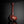 Load image into Gallery viewer, A glossy reddish-brown ceramic vase with a bulbous base and a long, slender neck, displayed on a reflective black surface against a dark gray background.
