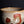 將圖片載入到圖庫檢視器中， Ceramic bowl with red and brown speckles on a dark background
