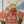 Load image into Gallery viewer, A colorful hand-drawn illustration of a samurai warrior in ornate armor, centered on a light background with a blue geometric shape behind the figure.
