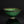 將圖片載入到圖庫檢視器中， A green glazed ceramic bowl with dark dripping glaze details, displayed on a reflective black surface against a dark background.
