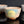 Load image into Gallery viewer, Three ceramic cups with different designs on a reflective surface

