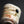 Load image into Gallery viewer, Close-up of a ceramic cup with textured surface and dark eye on a black background
