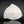 Load image into Gallery viewer, An organic-shaped white ceramic plate with a textured, crackled gray pattern on the bottom half, displayed on a reflective black surface against a dark gray background.

