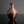 將圖片載入到圖庫檢視器中， A metallic copper-colored vase with a ribbed textured pattern on the upper half, standing on a reflective black surface against a dark gray background.
