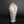 Load image into Gallery viewer, A ceramic vase with a pear-shaped body, featuring a textured gray and white glaze with brown speckles and hand-painted floral motifs on the sides, set against a dark gray background.

