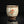 Load image into Gallery viewer, Ceramic cup with decorative design on a black background
