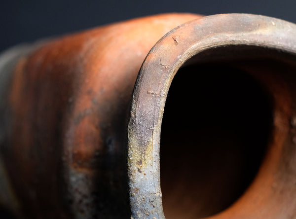 Close-up of a vase with dark background