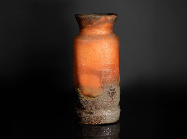Ceramic vase with gradient color on a black background