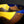 Load image into Gallery viewer, Wooden bowl with yellow and blue geometric design on a dark background
