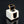 Load image into Gallery viewer, White cube-shaped object with a black interior on a black background
